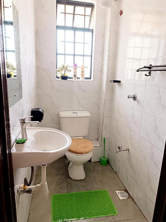 Koupelna v ubytování Nyanchy Homes
