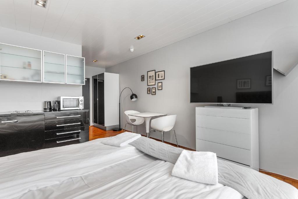 Eldhús eða eldhúskrókur á Midtown Hotel