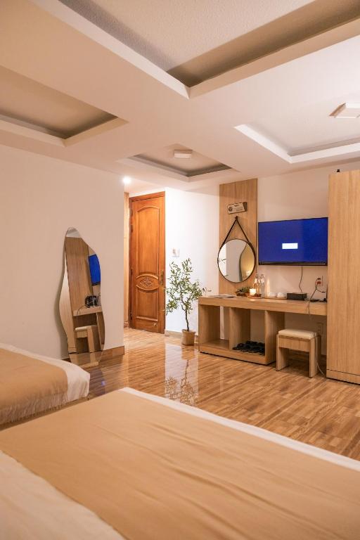 TV a/nebo společenská místnost v ubytování Phương Trinh Hotel
