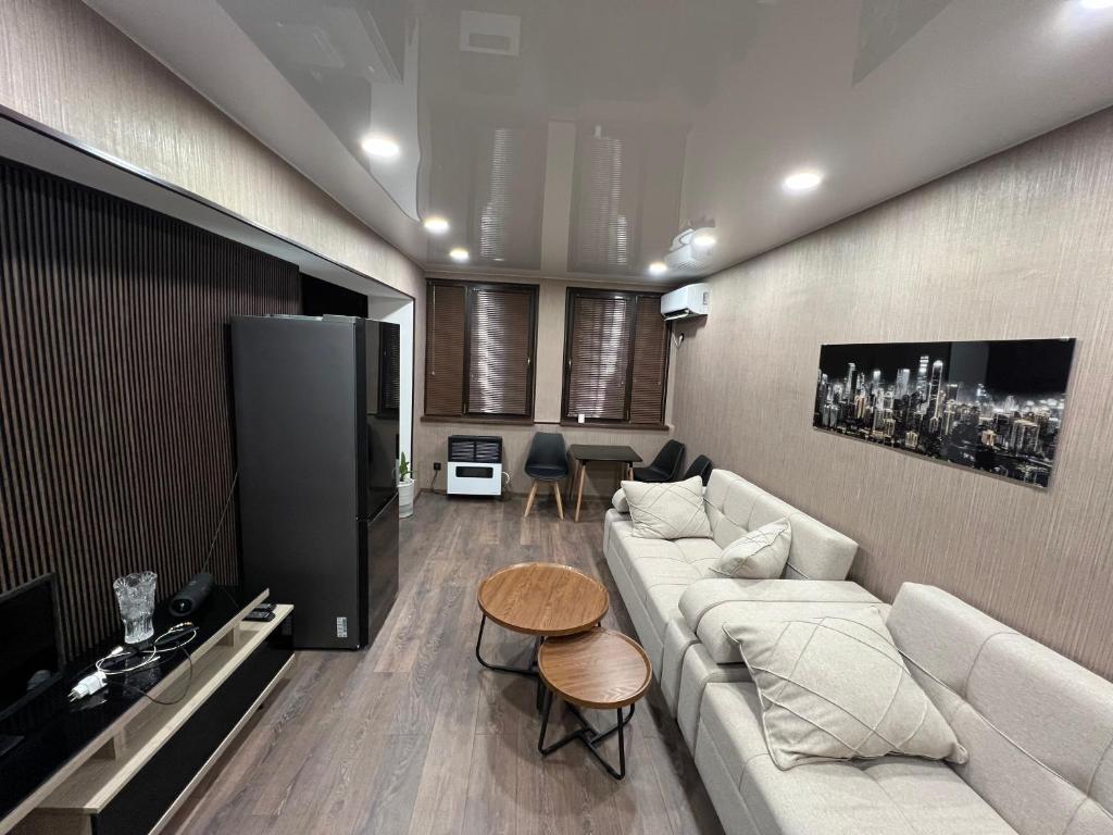 Posezení v ubytování Уютный апартамент в сердце сабуртало