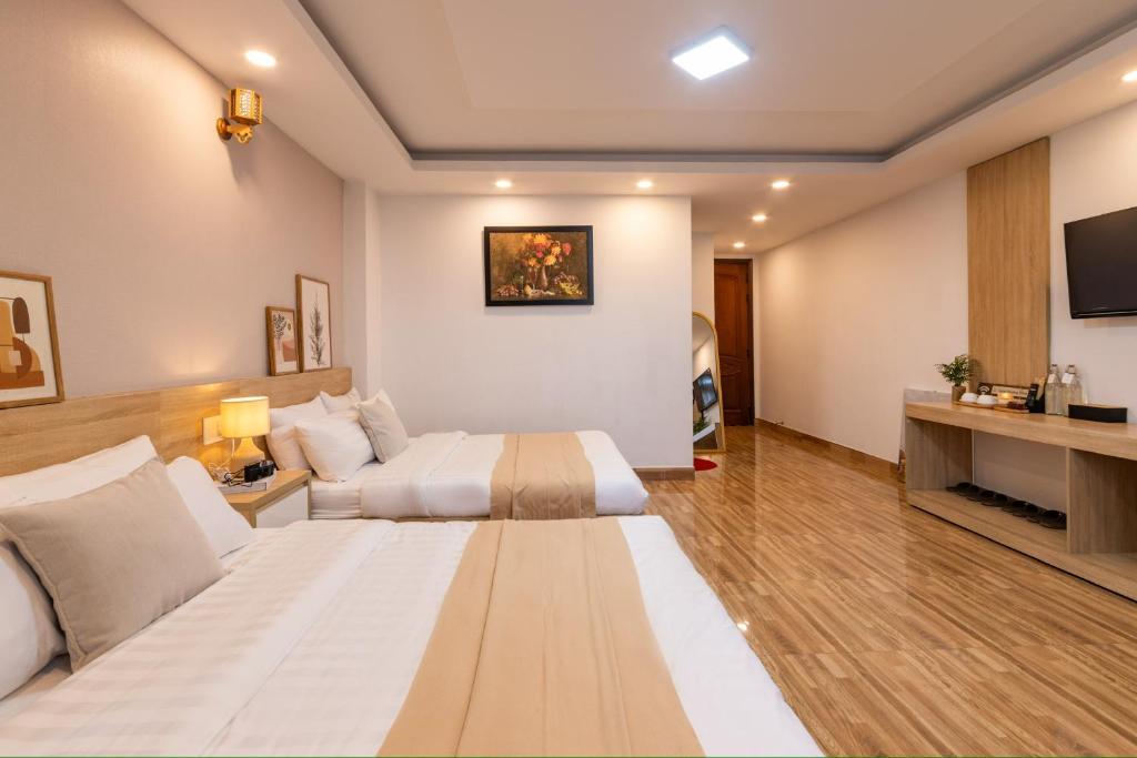 TV a/nebo společenská místnost v ubytování Phương Trinh Hotel