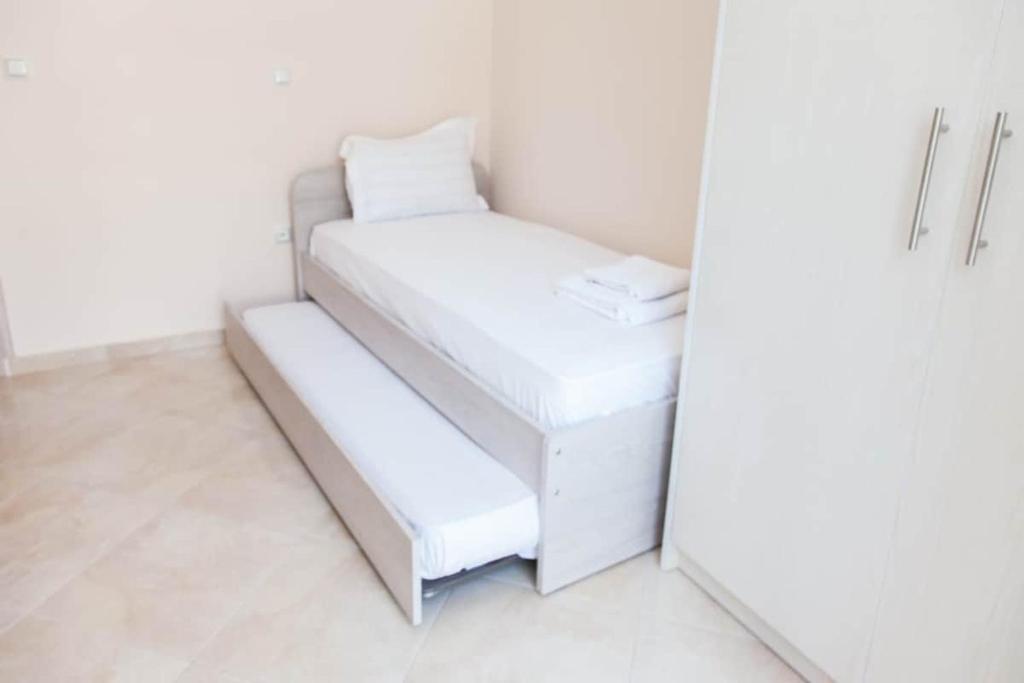 Postel nebo postele na pokoji v ubytování Great Apartment in Piraeus