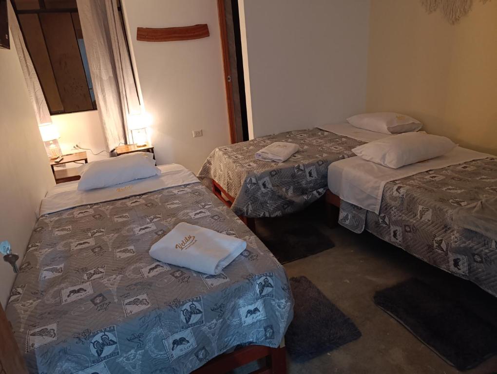 Ένα ή περισσότερα κρεβάτια σε δωμάτιο στο Velilu Luxury