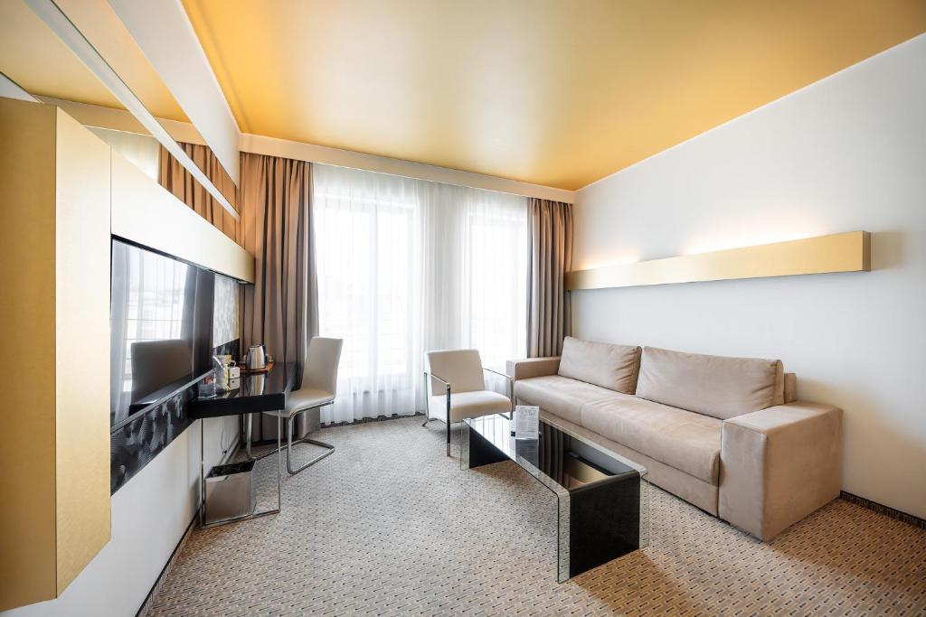TV a/nebo společenská místnost v ubytování Grandior Hotel Prague