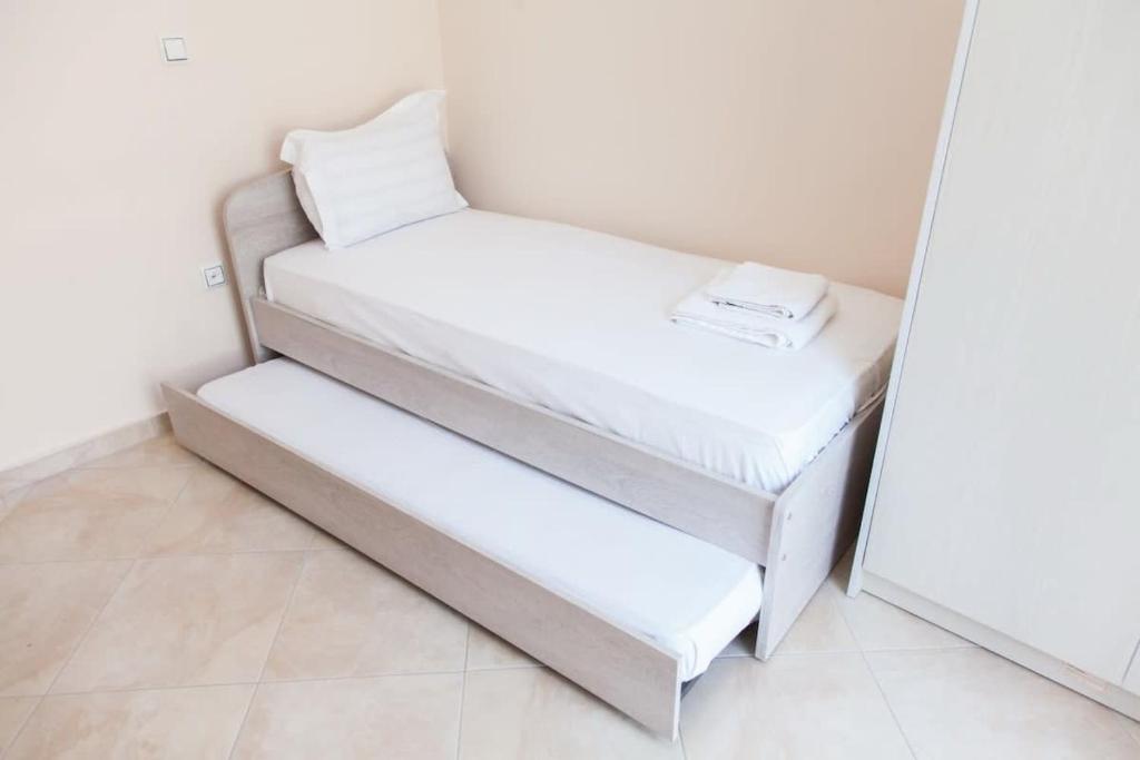 Postel nebo postele na pokoji v ubytování Great Apartment in Piraeus