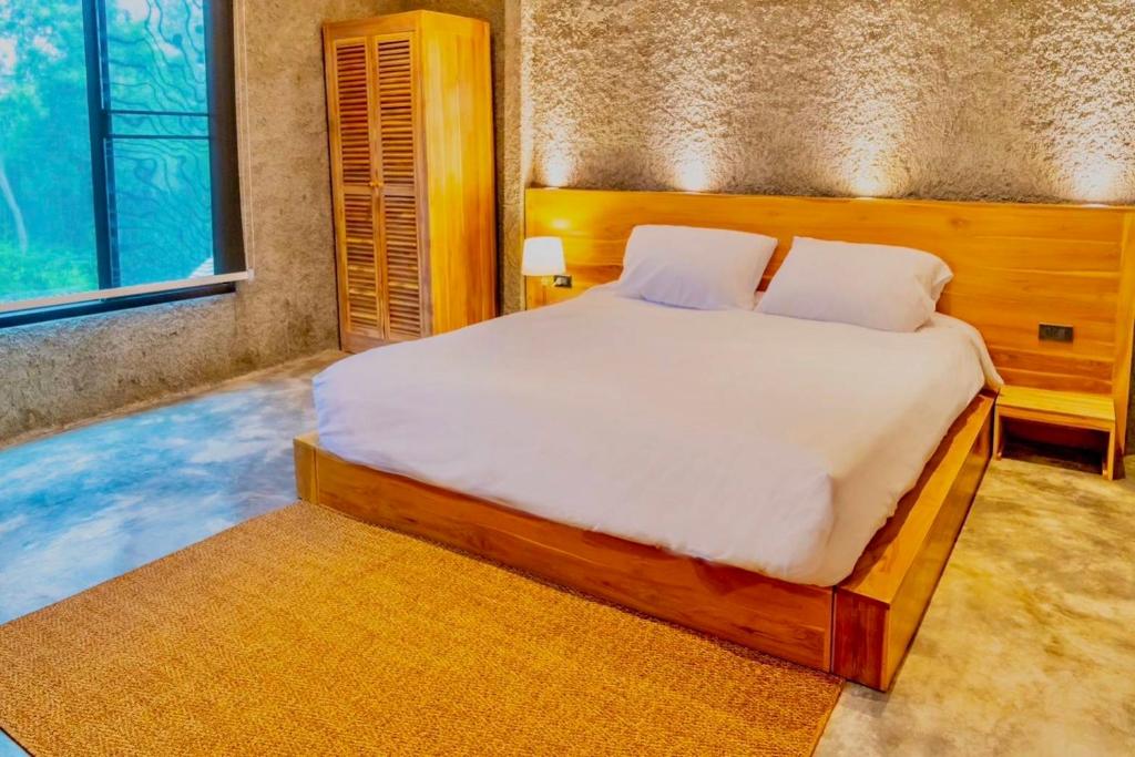 Postel nebo postele na pokoji v ubytování R resident resort