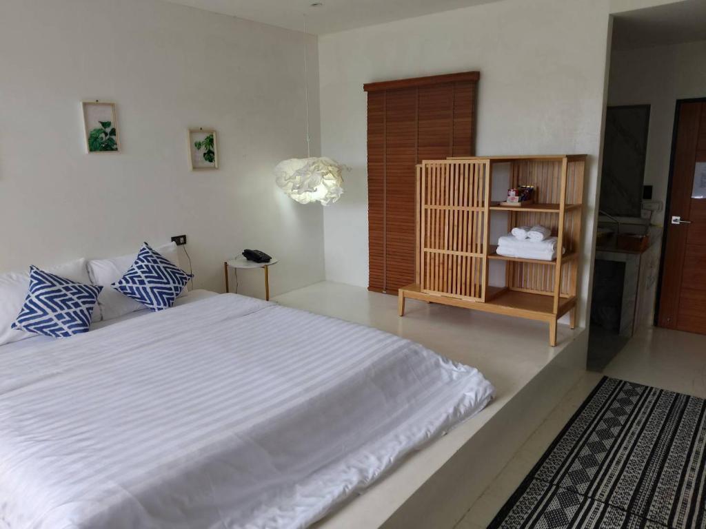 Postel nebo postele na pokoji v ubytování R resident resort