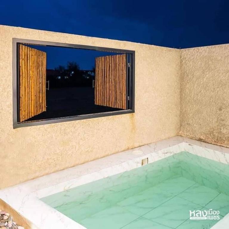 Bazén v ubytování R resident resort nebo v jeho okolí