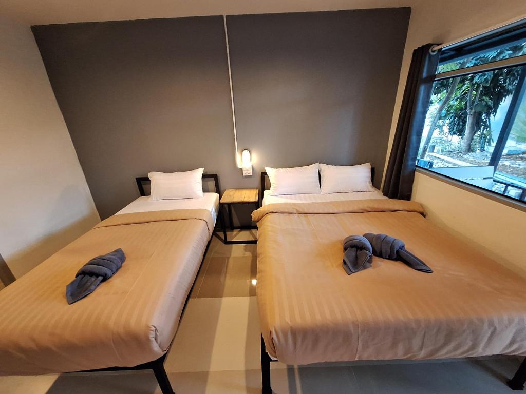 Postel nebo postele na pokoji v ubytování Slumberland at Pai