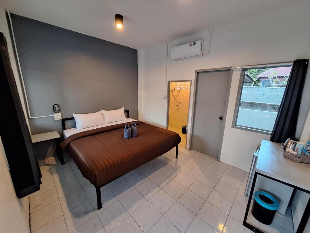 Postel nebo postele na pokoji v ubytování Slumberland at Pai
