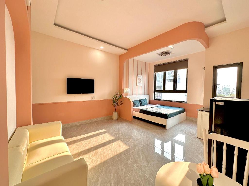 TV a/nebo společenská místnost v ubytování Corgi House Danang