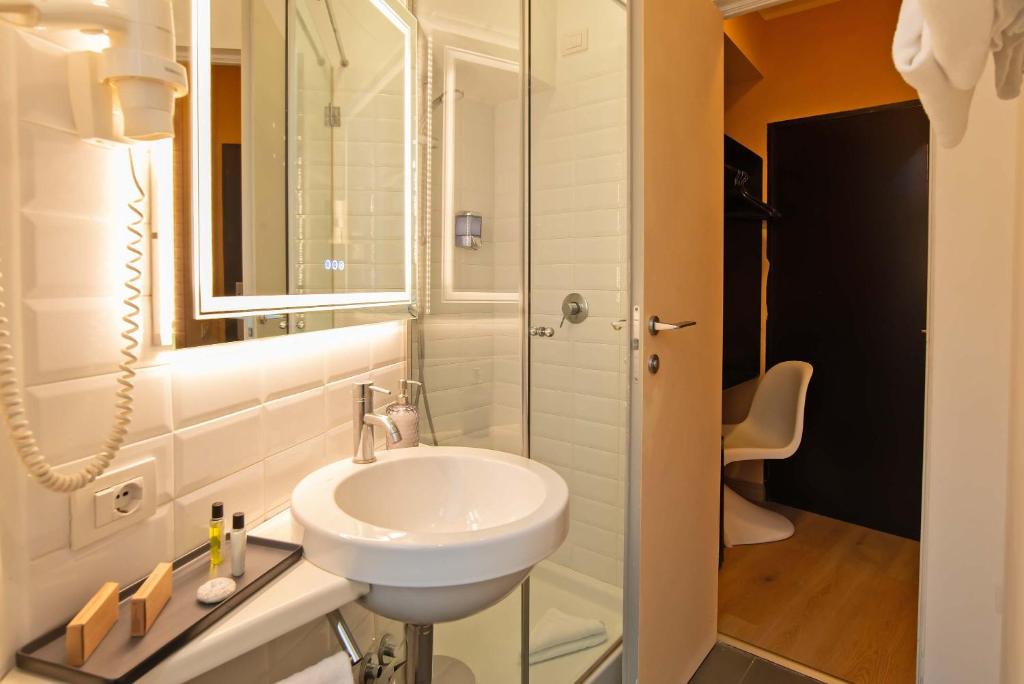 Koupelna v ubytování Hotel Elite