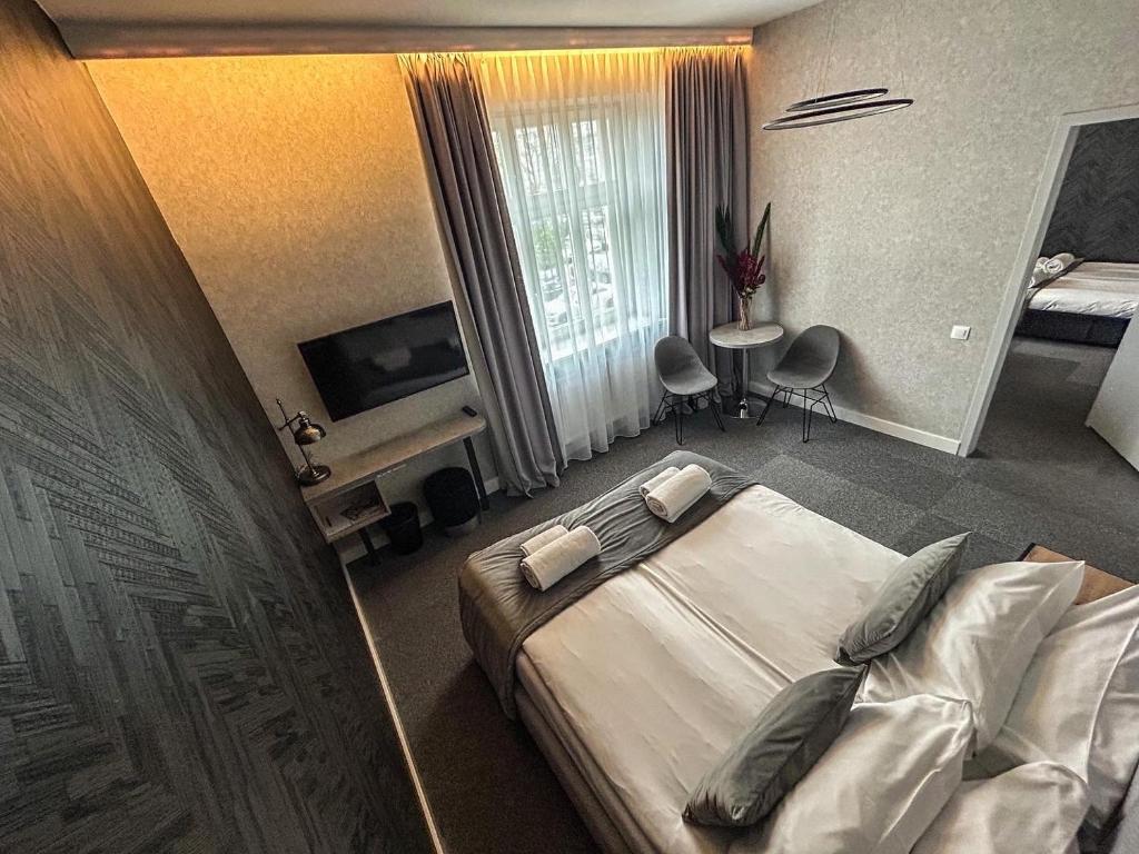 Postel nebo postele na pokoji v ubytování Hotel Gdynia Boutique