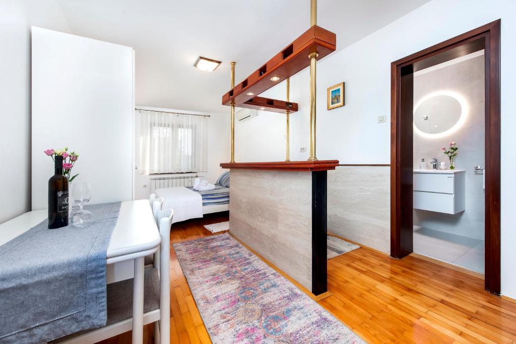 Postel nebo postele na pokoji v ubytování Apartments Carmelo