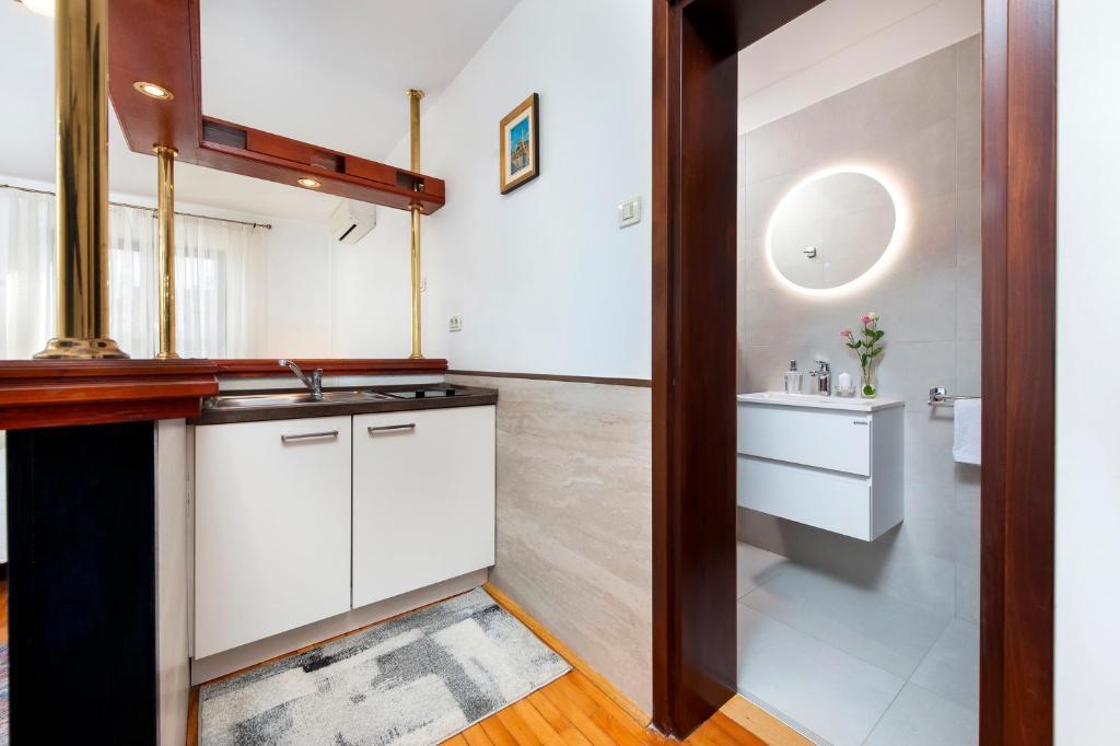 Koupelna v ubytování Apartments Carmelo