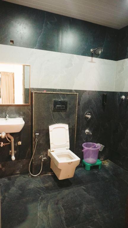 Koupelna v ubytování Hotel Sahara Residency