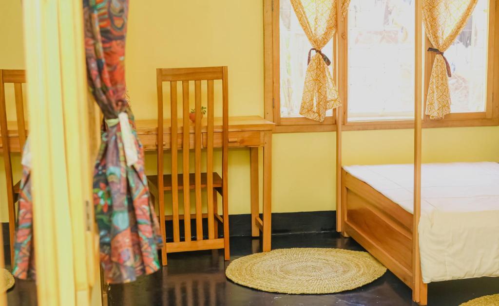 Postel nebo postele na pokoji v ubytování Kiwavi Home