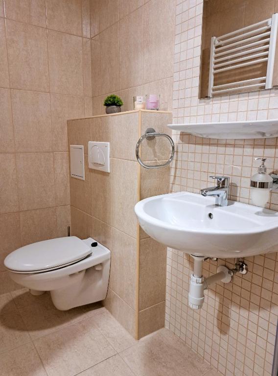 Koupelna v ubytování Leimen Centrum
