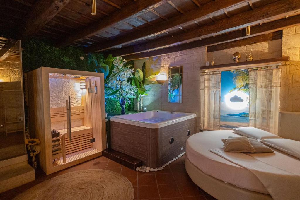 Postel nebo postele na pokoji v ubytování Suite16 & spa