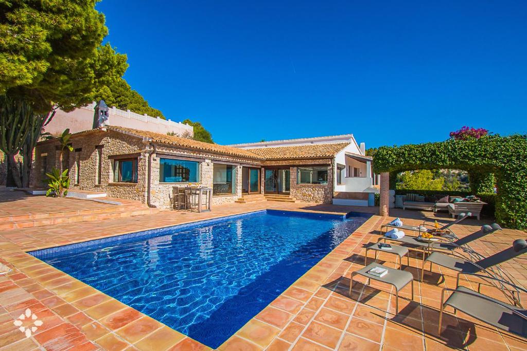 Fotografia z galérie ubytovania Villa Gaviota Blanca by Abahana Luxe v destinácii Benissa