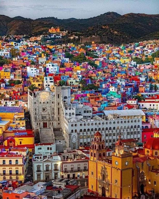 a view of a large city with buildings at Casa Jasso in Guanajuato
