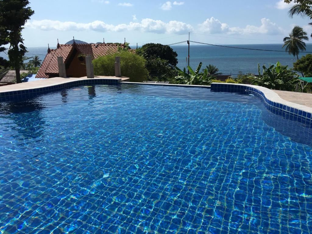 Bazén v ubytování Sea Rock Resort nebo v jeho okolí