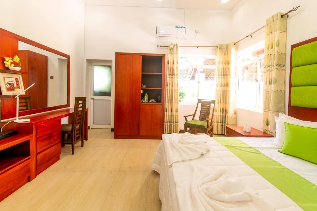 Postel nebo postele na pokoji v ubytování Cogent Holiday Home