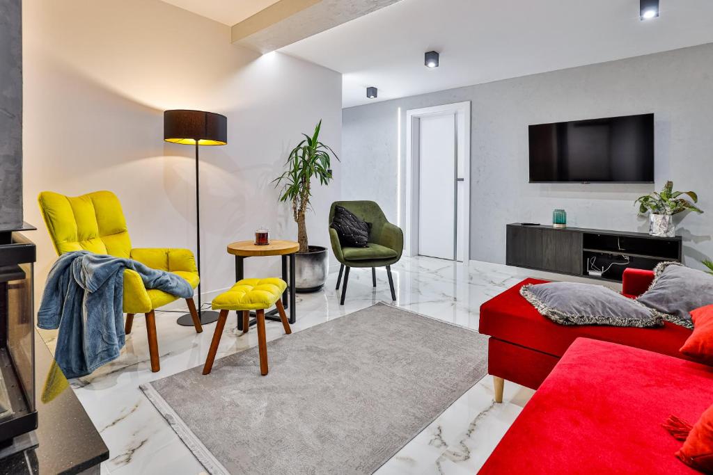 Televízia a/alebo spoločenská miestnosť v ubytovaní Nowoczesne Apartamenty typu Superior - Bulwary Rabka Zdrój - Balia - Blisko Park Zdrojowy