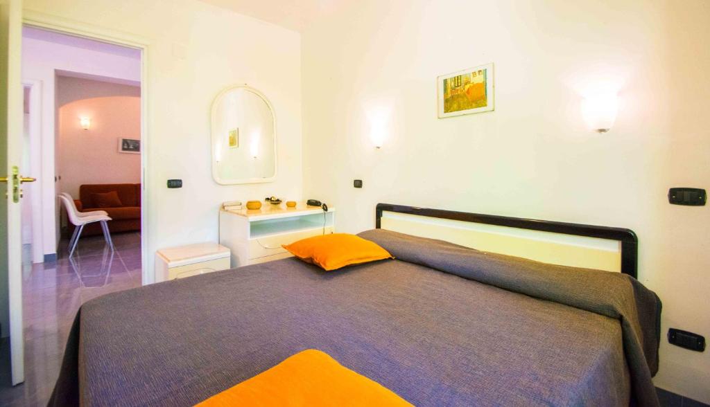 Postel nebo postele na pokoji v ubytování Villaggio Costa Real