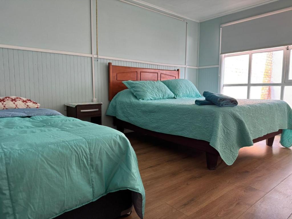 World's End Hostal - Triple Room With Shared Bathroom