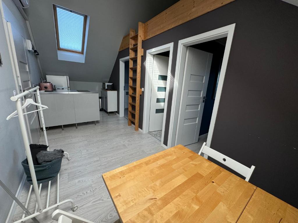 A kitchen or kitchenette at ZiMo Taliándörögdi MoZiHáz