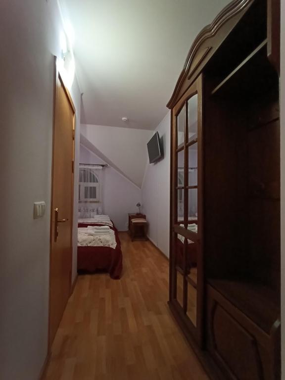 Postel nebo postele na pokoji v ubytování Вілла Токай