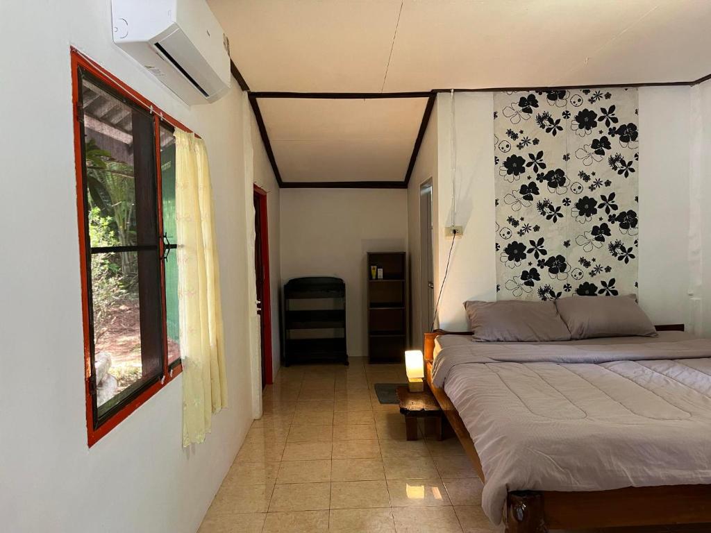 Postel nebo postele na pokoji v ubytování Ao Pong Resort