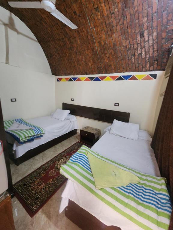 Postel nebo postele na pokoji v ubytování Dara guest House