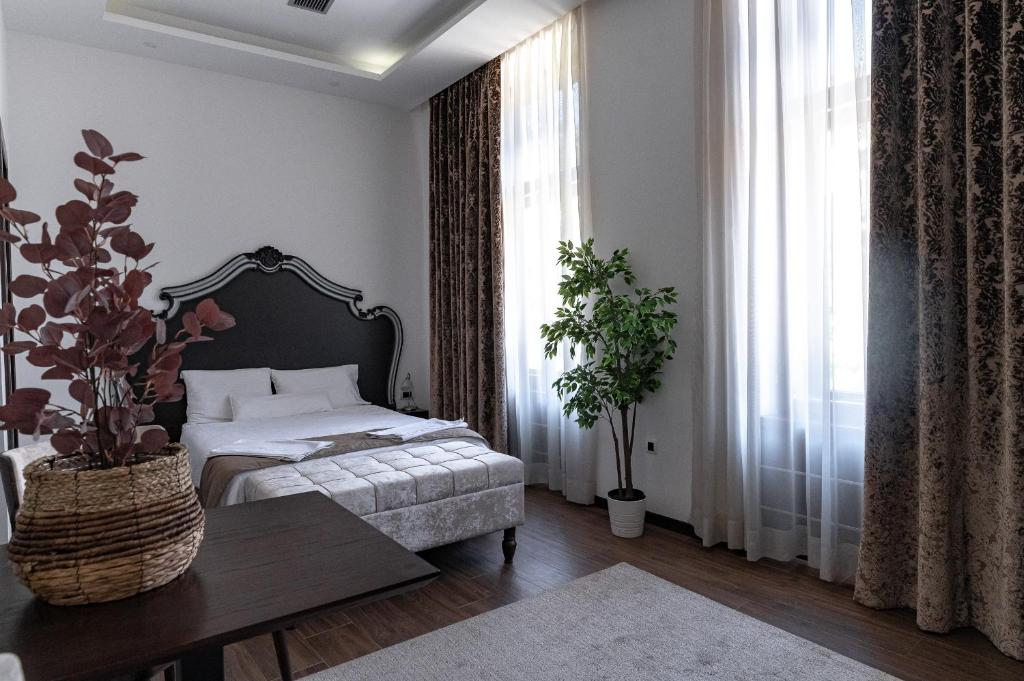Postel nebo postele na pokoji v ubytování Apartmani Astral
