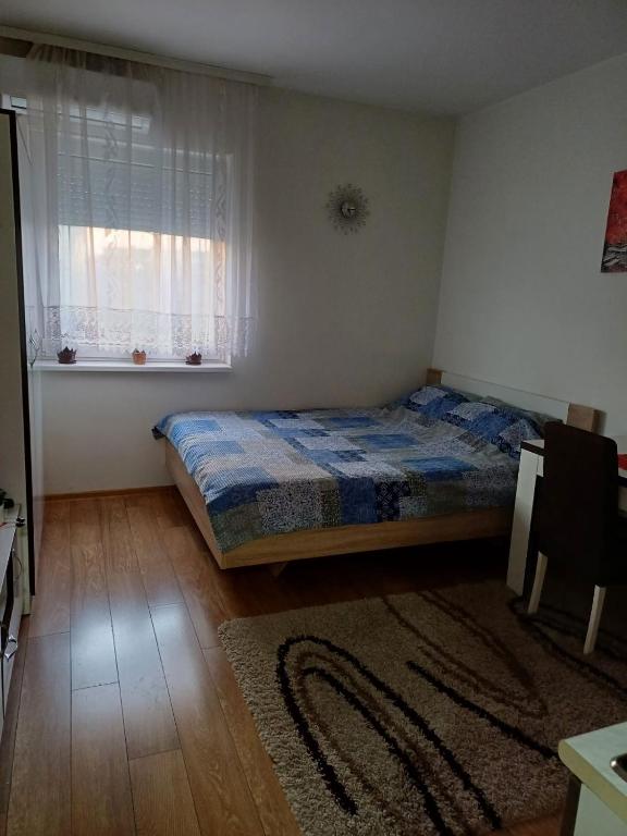 Postel nebo postele na pokoji v ubytování Stan na dan