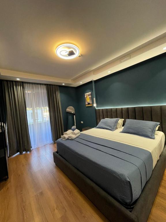 Postel nebo postele na pokoji v ubytování Peaky Hotel