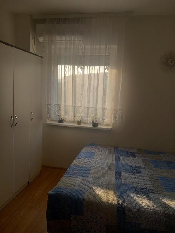 Postel nebo postele na pokoji v ubytování Stan na dan
