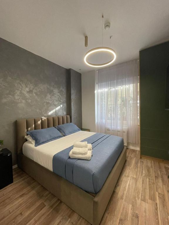 Postel nebo postele na pokoji v ubytování Peaky Hotel