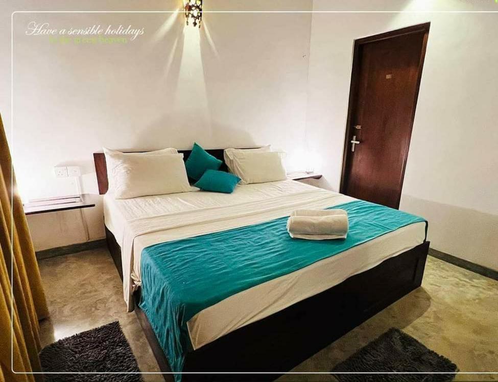 Postel nebo postele na pokoji v ubytování Villa Nook Serene