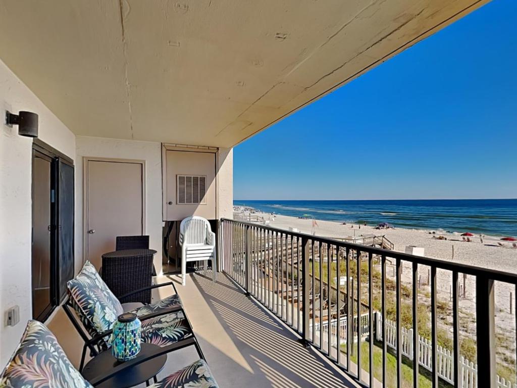 a balcony with a view of the beach at Ocean Breeze East #303 in Perdido Key