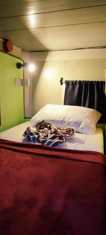 Postel nebo postele na pokoji v ubytování Eyy Hostel