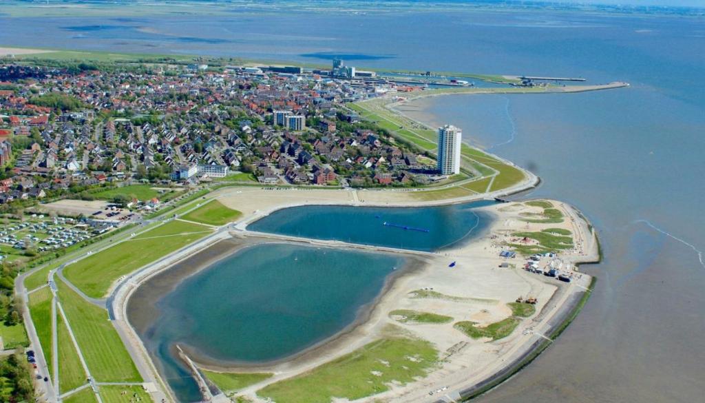an aerial view of a island in the water at Strandkiesel in Büsum