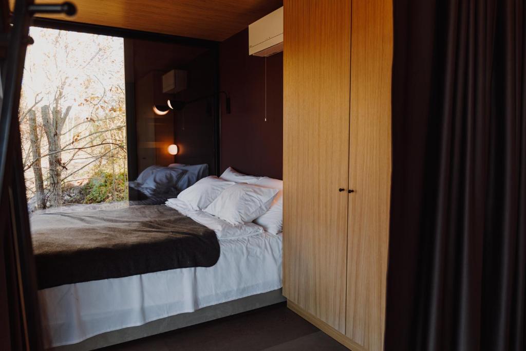 Postel nebo postele na pokoji v ubytování Rummu Holiday Home