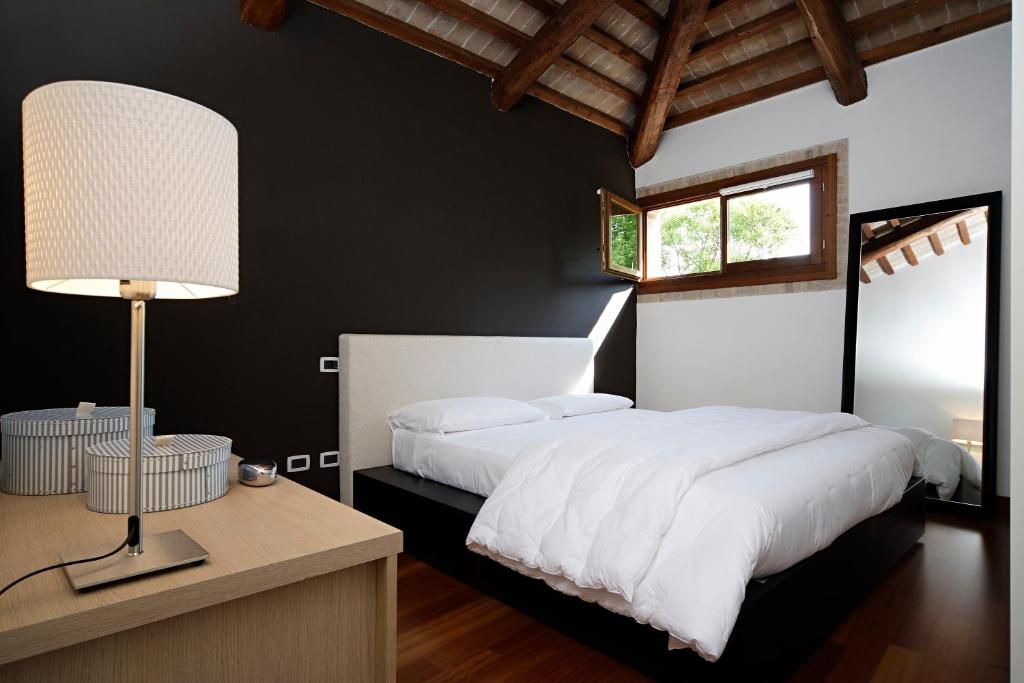 Postel nebo postele na pokoji v ubytování Villa Moro Lin Design Apartments