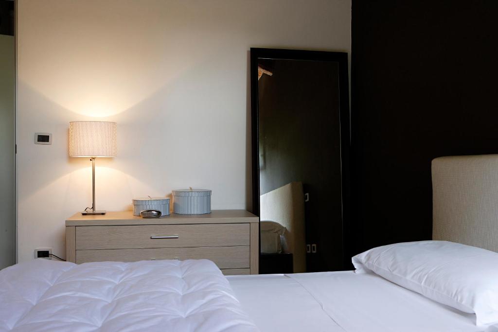 Postel nebo postele na pokoji v ubytování Villa Moro Lin Design Apartments