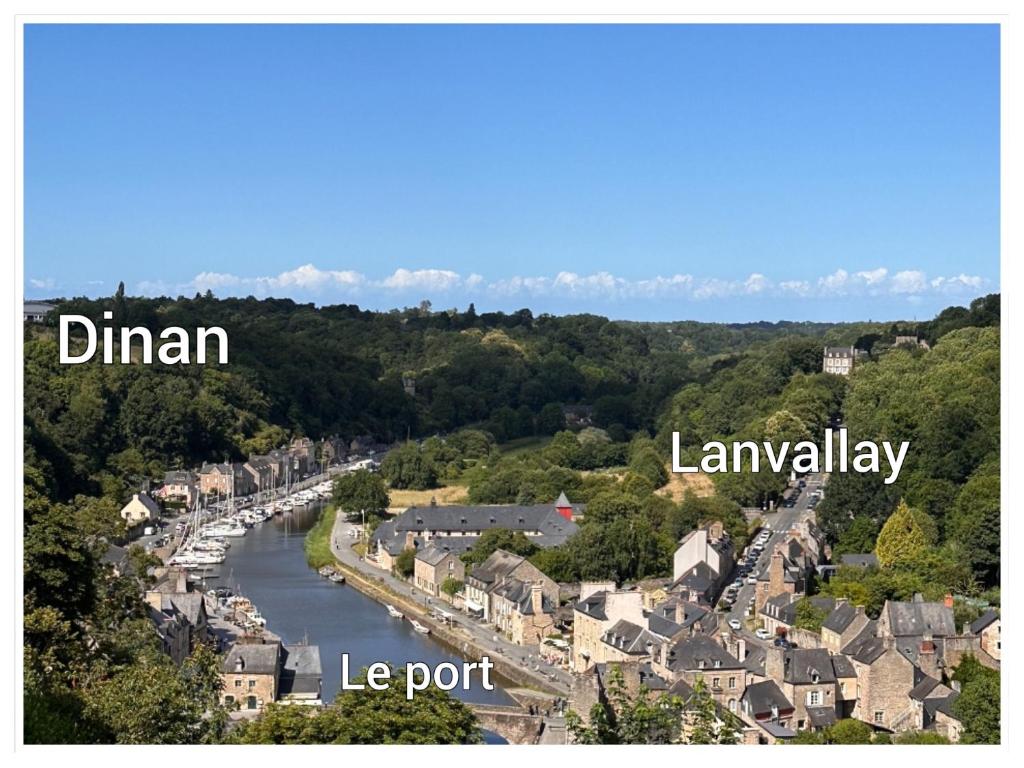 a city with a river and a town with houses at Les libellules, maison de ville, classé 4 étoiles avec baignoire spa à Dinan Lanvallay in Lanvallay