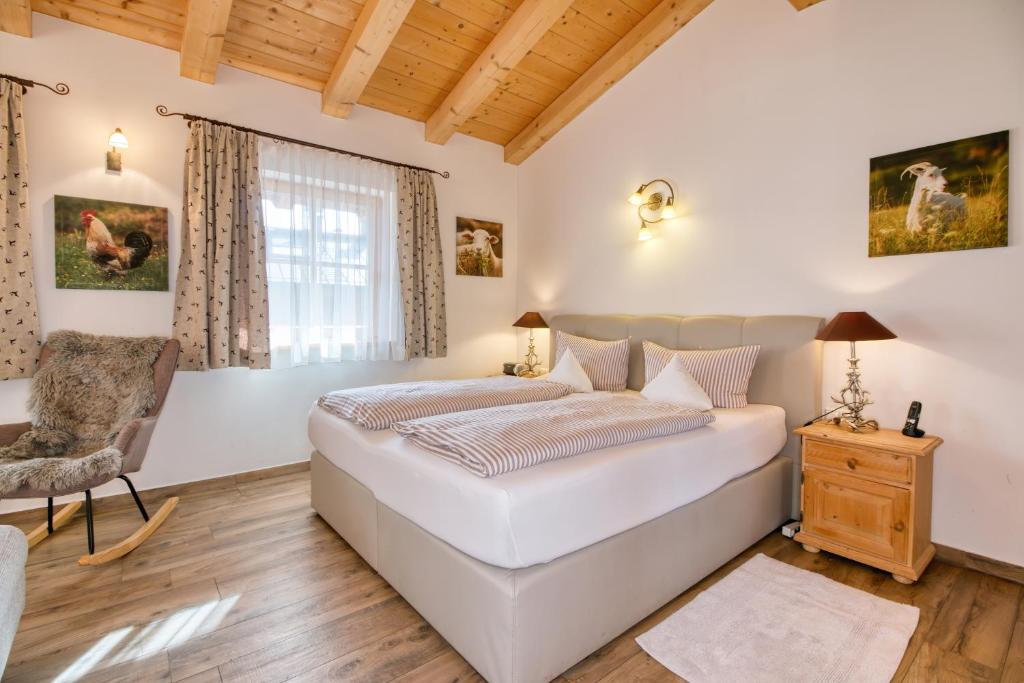 Postel nebo postele na pokoji v ubytování Winklmoos Sonnenalm