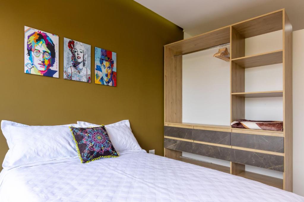 Postel nebo postele na pokoji v ubytování Caobos Center Coliving & Coworking