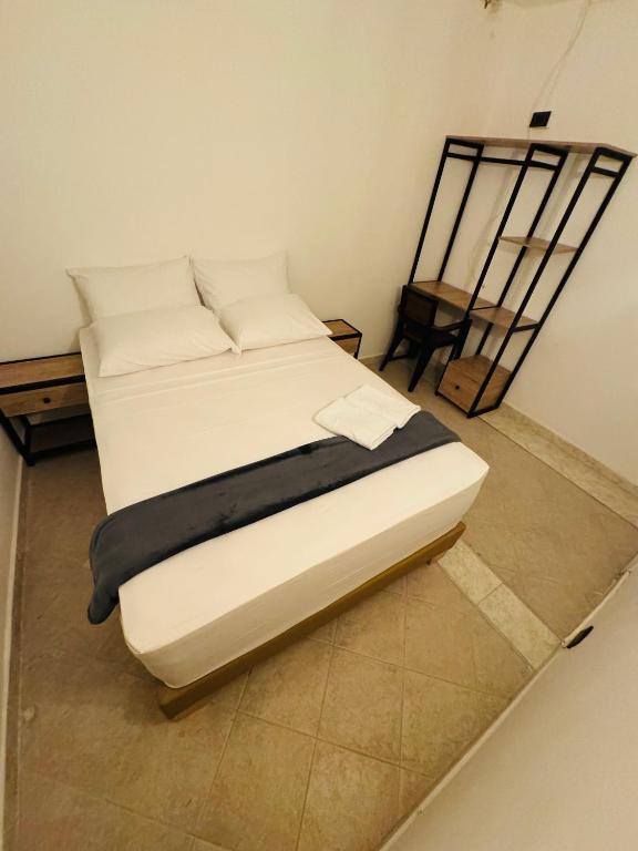 Postel nebo postele na pokoji v ubytování Hotel Estadio 80